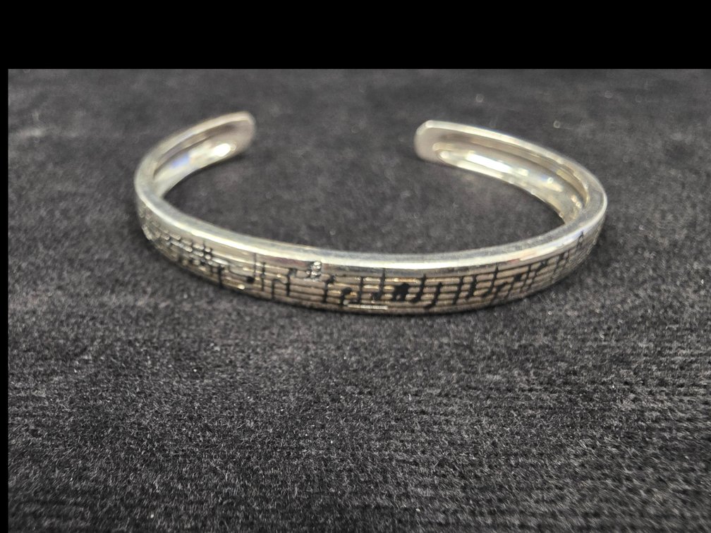 Open Bangle Bracelet w/Music Note Pattern (Marked Sterling Silver)