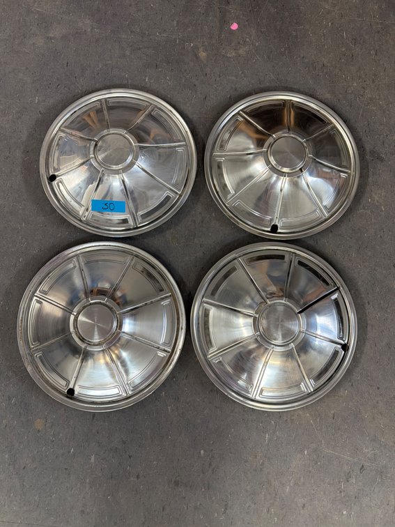 Set of Plymouth hubcaps