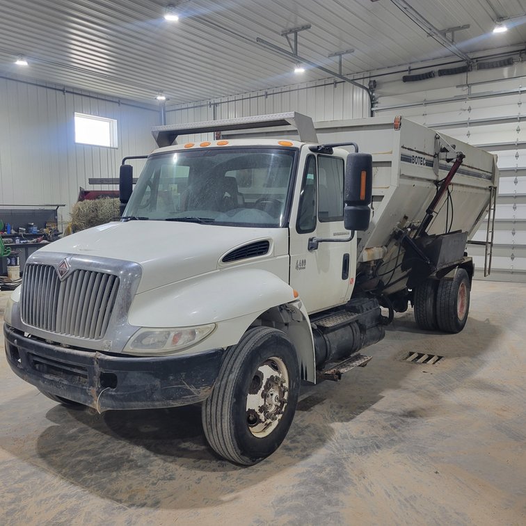 Image for Sunflower Drill and International Feed Truck