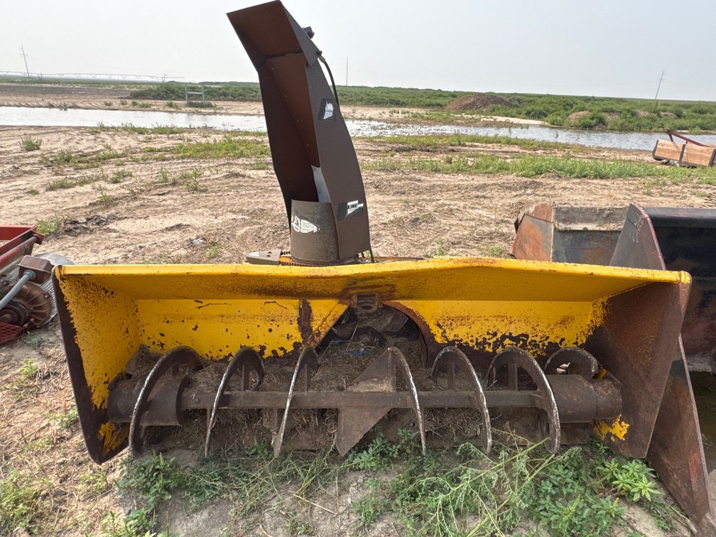 Skid steer snow blower