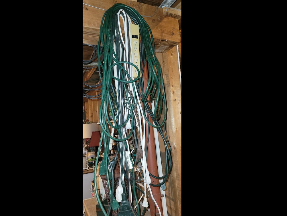 EXT. CORDS & POWER BAR