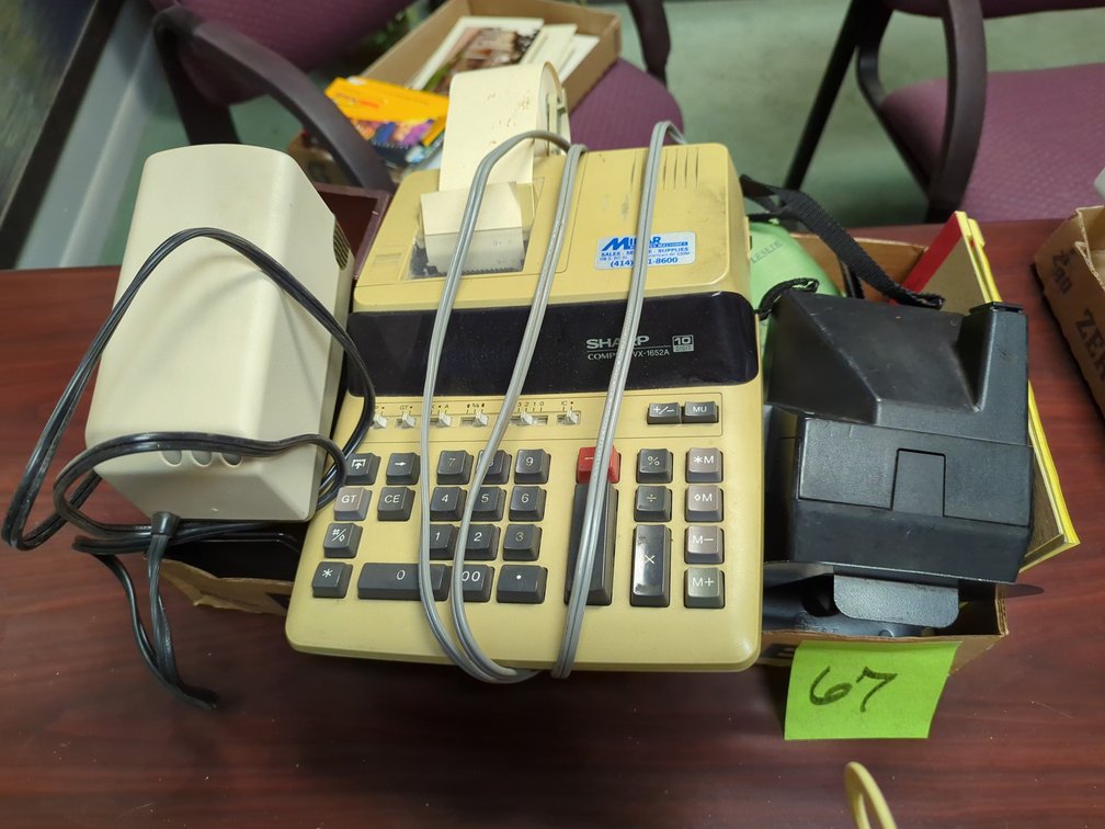 Sharpener, Calculator, Polaroid Camera and Supplies 