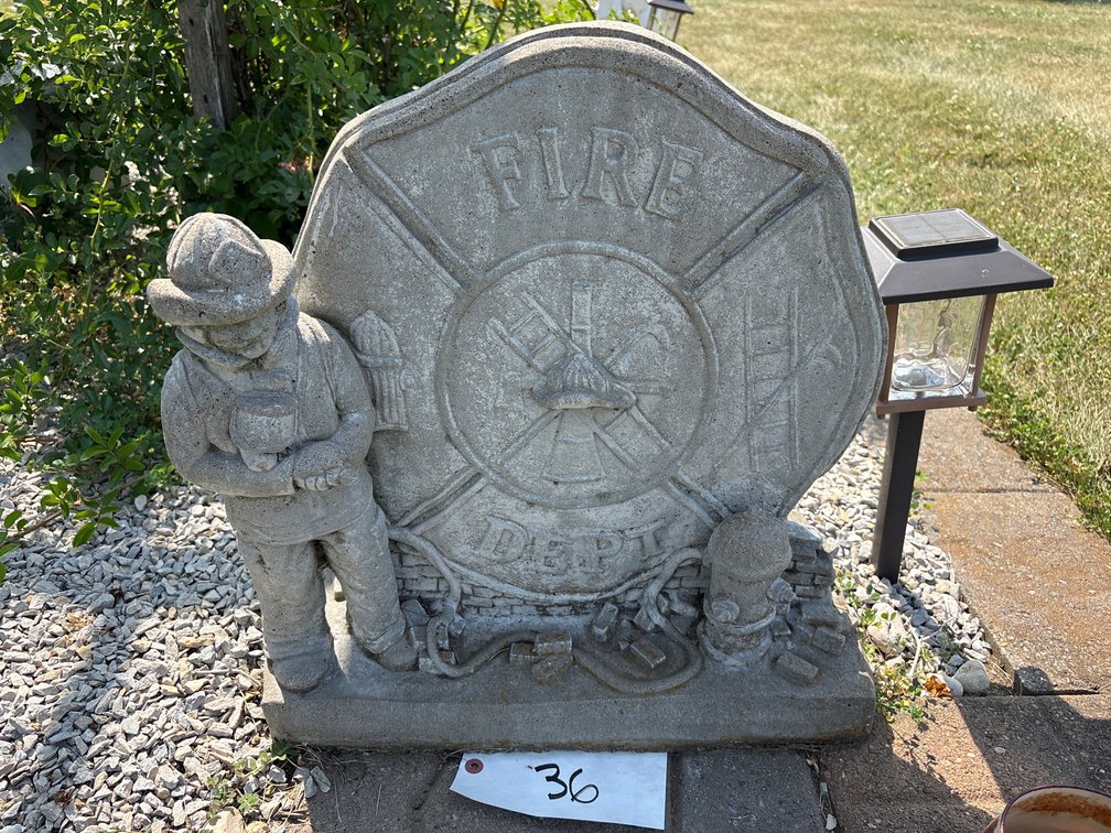Cement, fire department statue