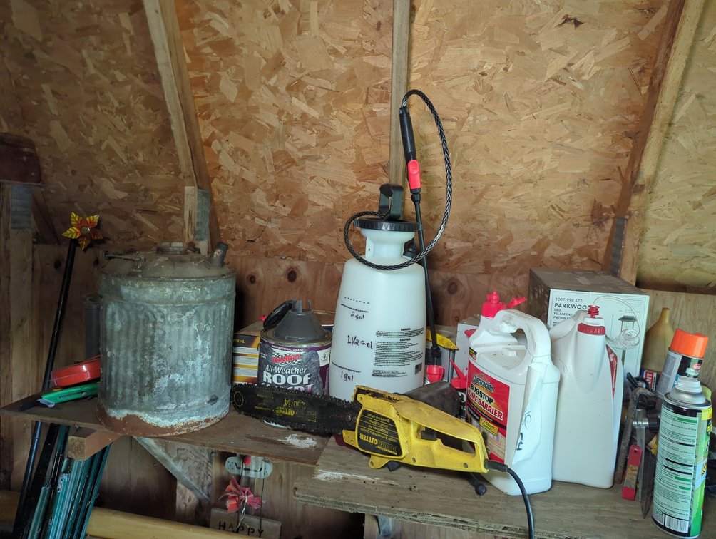 Sprayer, Hand Spreader & Items on Shelf