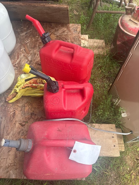 (3) plastic 2 gallon gas cans, and safety spouts