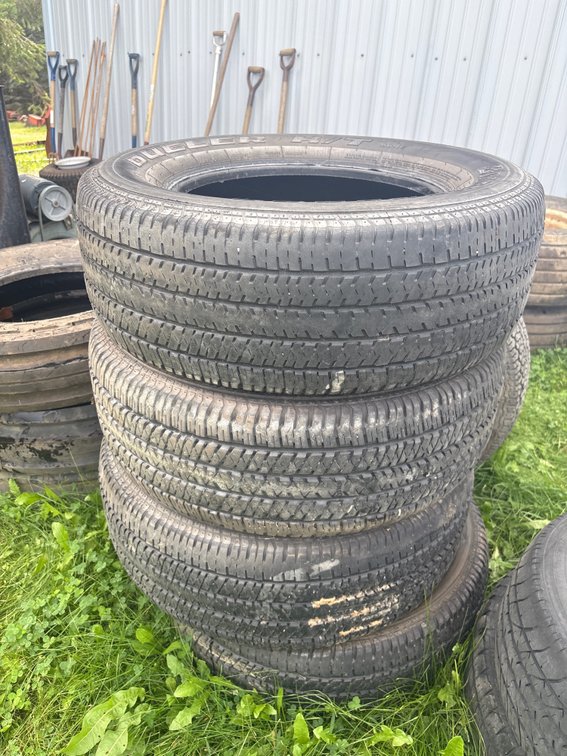 (4) Bridgestone Dueler H/T  P235-65R 16 tires