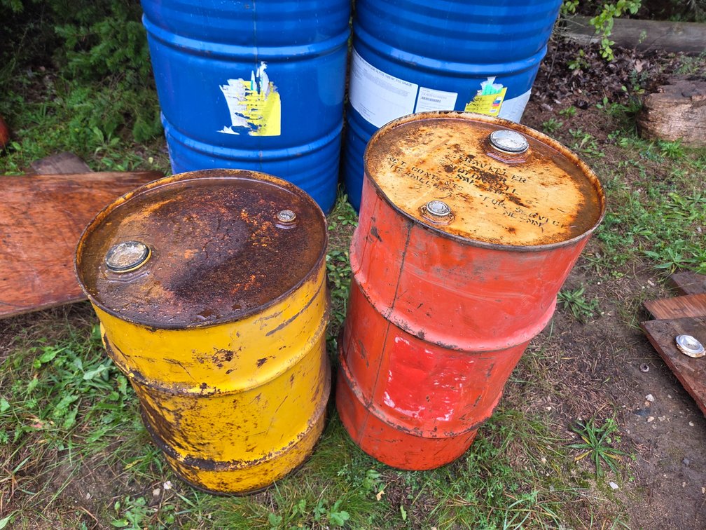 (2) Smaller Metal Barrels