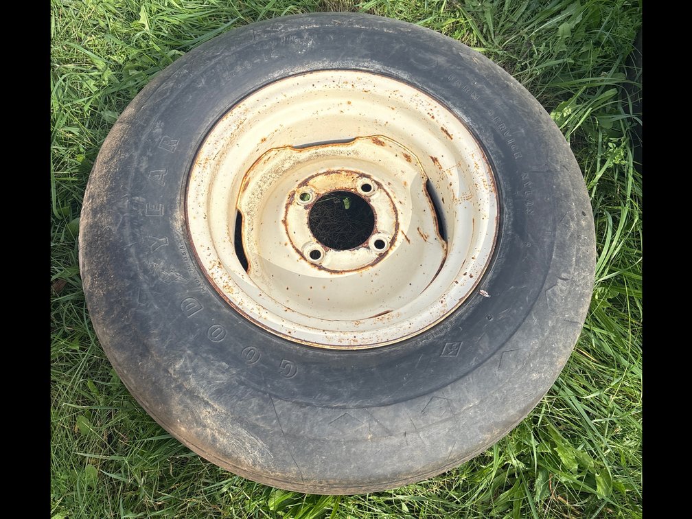 4 bolt 14 inch rim w/ 7.50-14 tire