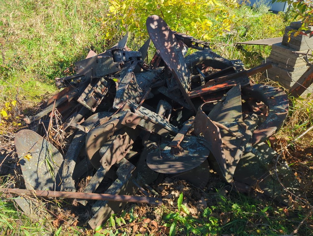 Allis Chalmers Plow Bottoms Pile