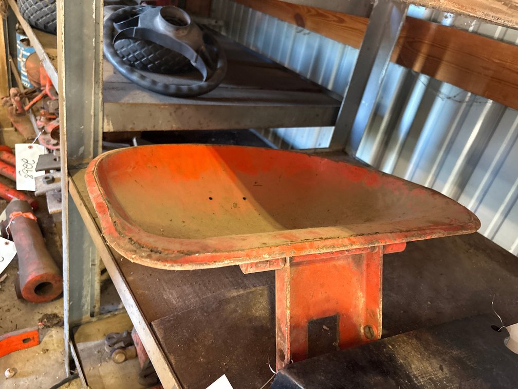 Orange tractor seat