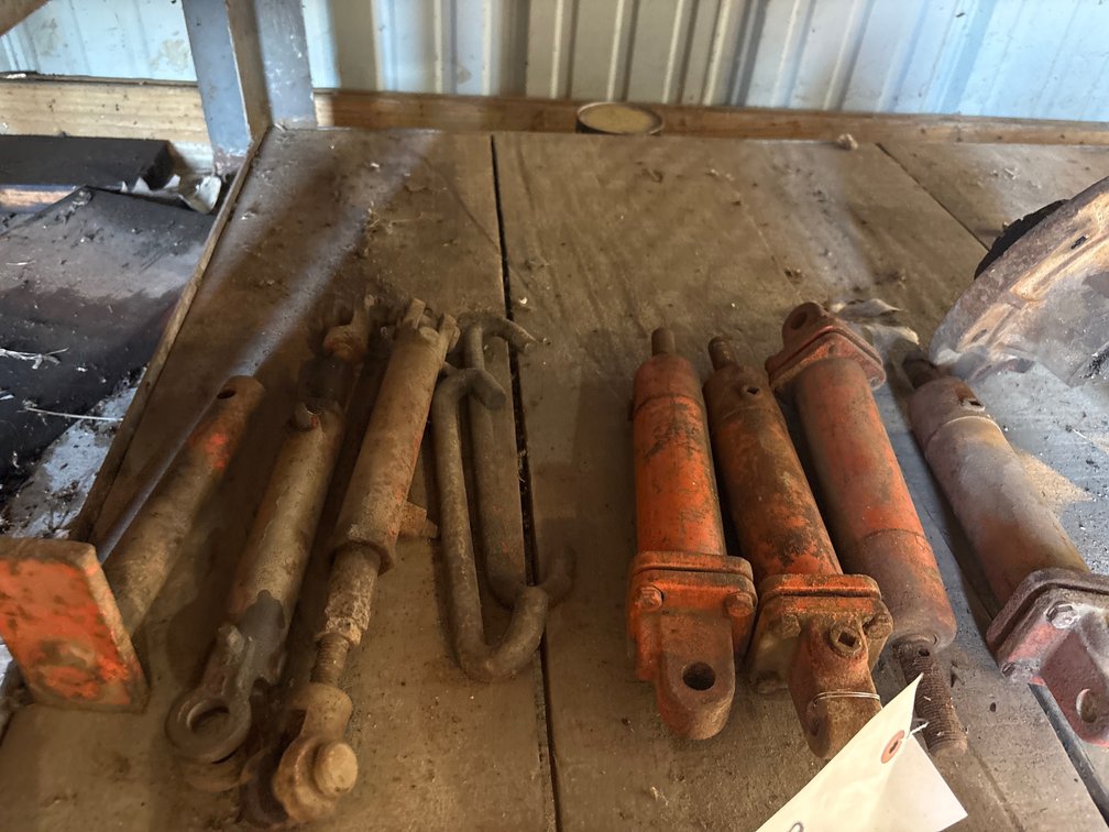 Orange Metal Linkage and cylinders