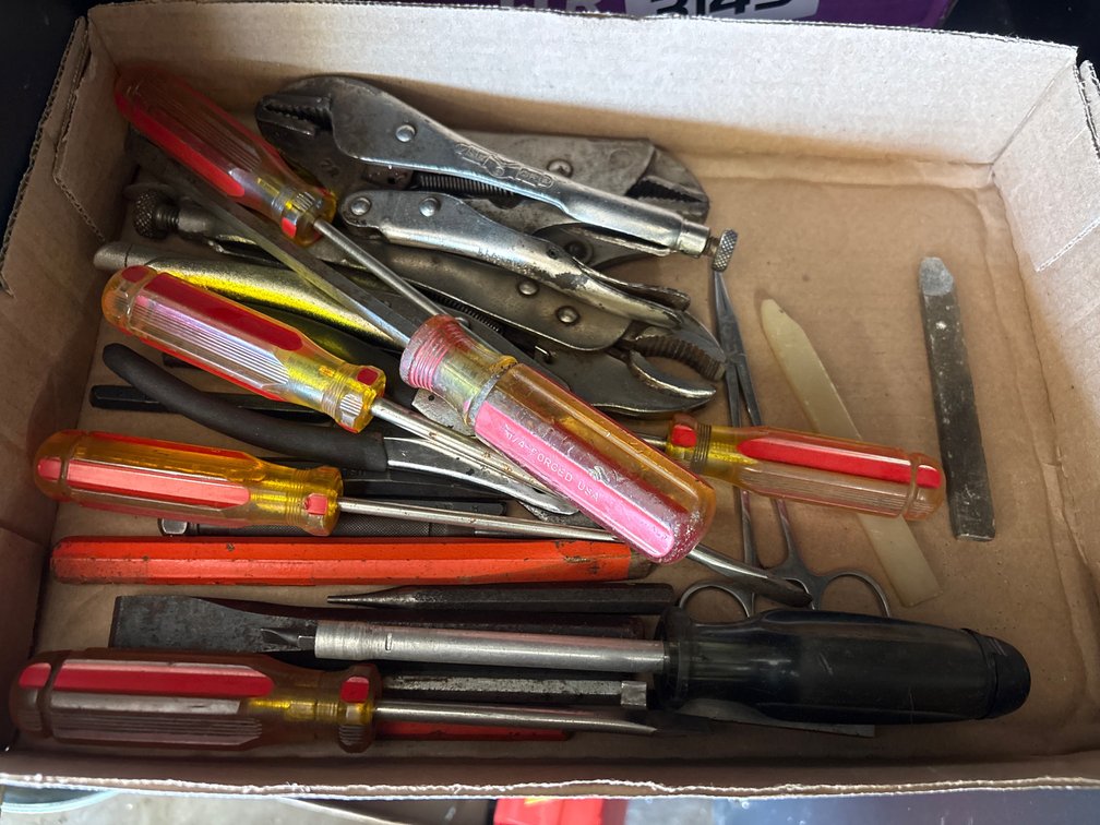 Screwdrivers, vise grips, tools