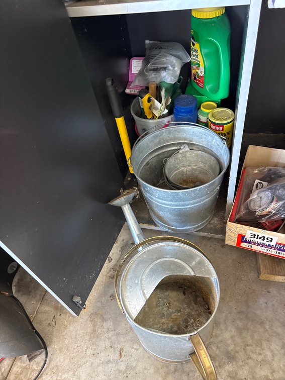 Watering can, buckets, garden tools and supplies