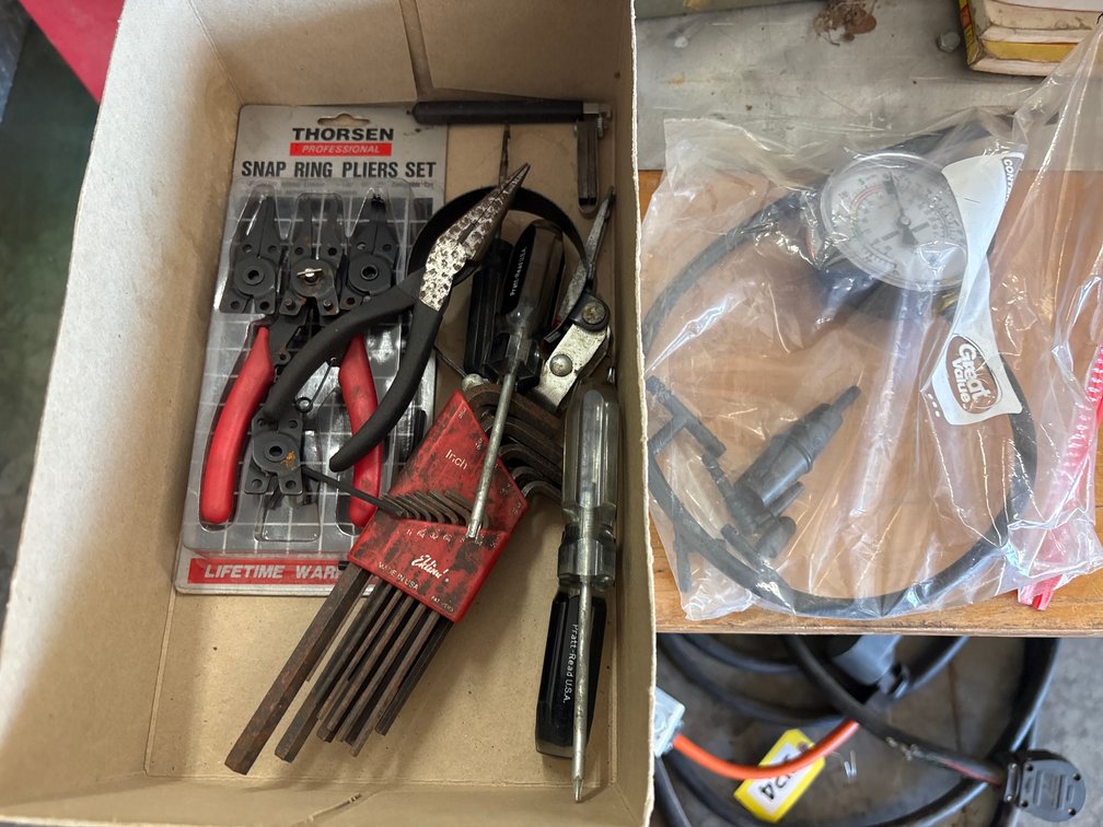 Snap ring pliers, hex and star wrenches, vacuum gage