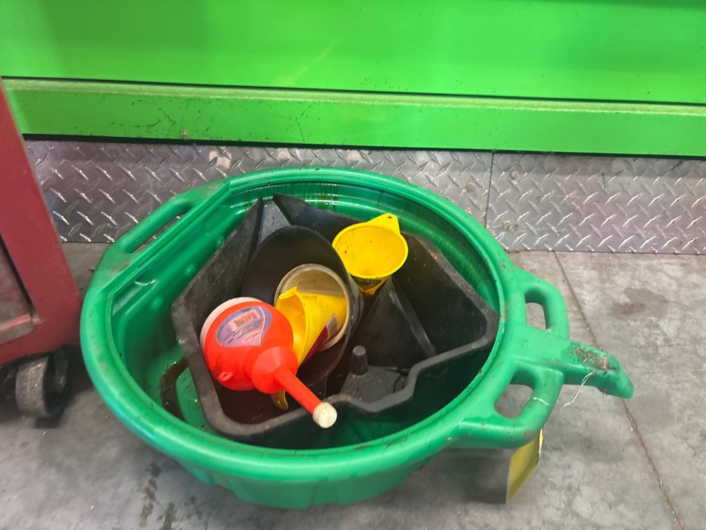 Oil collection pans and funnels