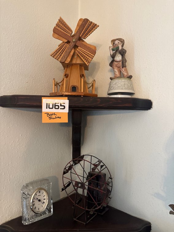 Windmill, ferris wheel, and boy eating figurine music boxes, clear glass clock