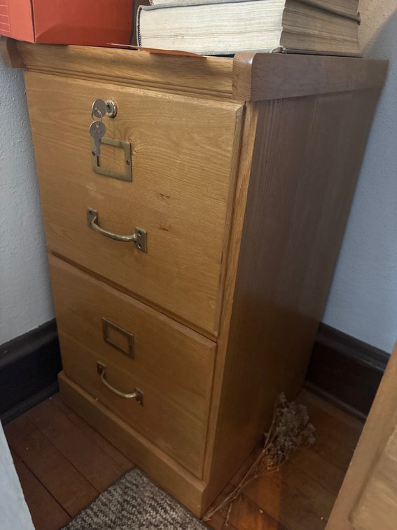 Wooden file cabinet with keys