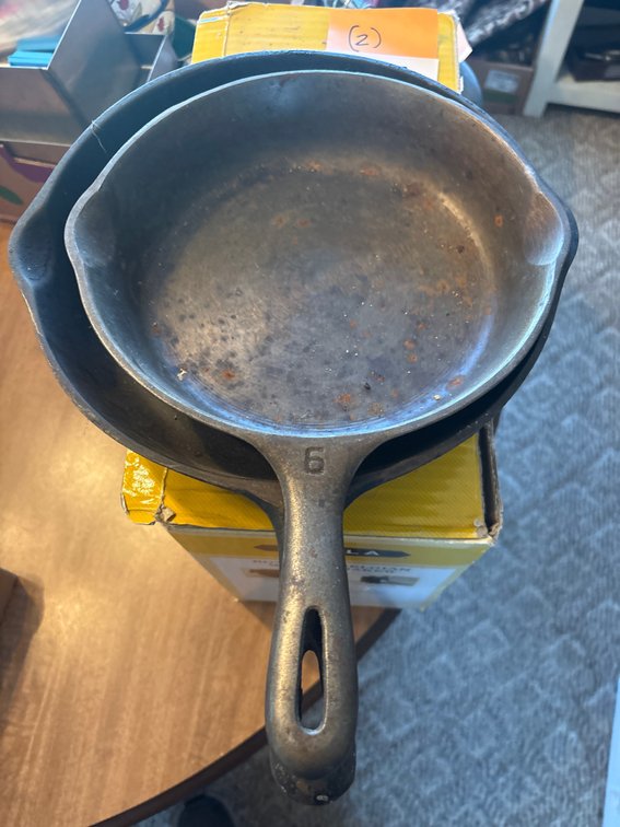 (2) cast iron frying pans