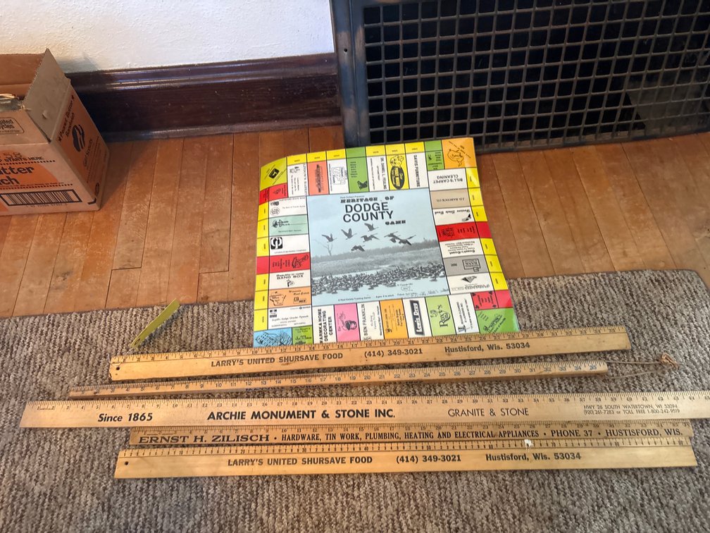 Vintage Dodge County Monopoly game, local advertising yardsticks