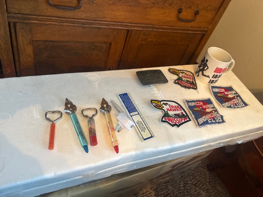 Local advertising, bottle openers, snowmobile club patches