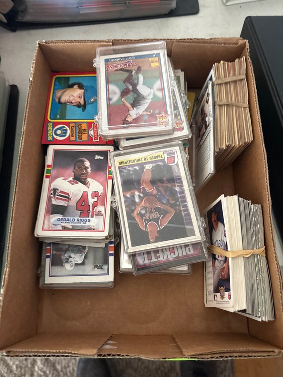 Box of loose baseball cards from 80s and 90s