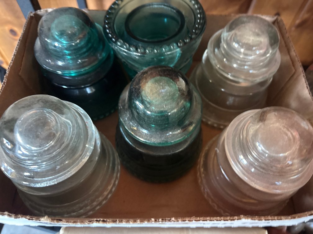 Blue and clear glass insulators number 42