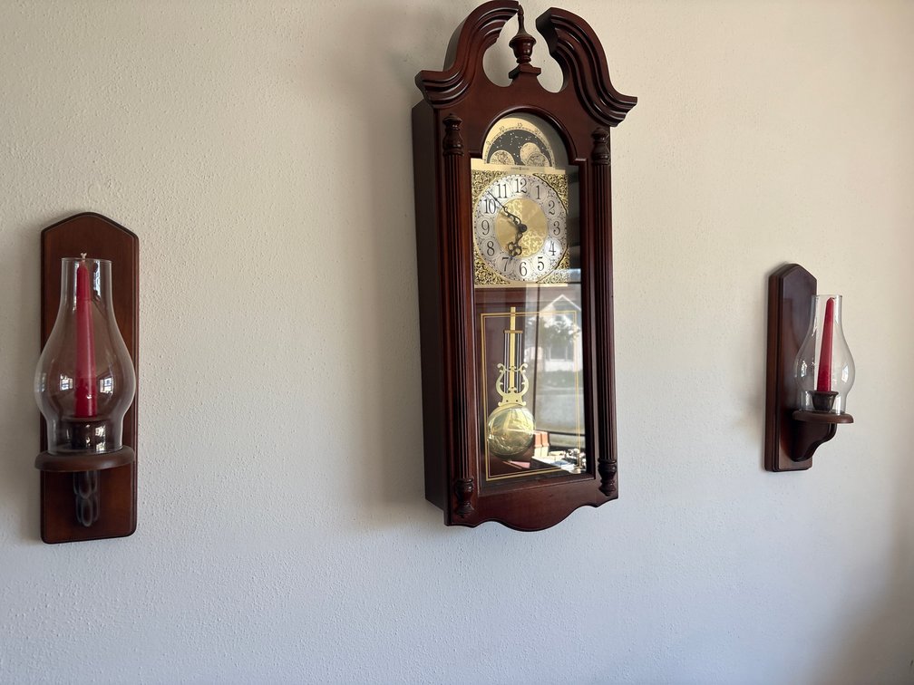 Howard Miller wall clock and wall sconces