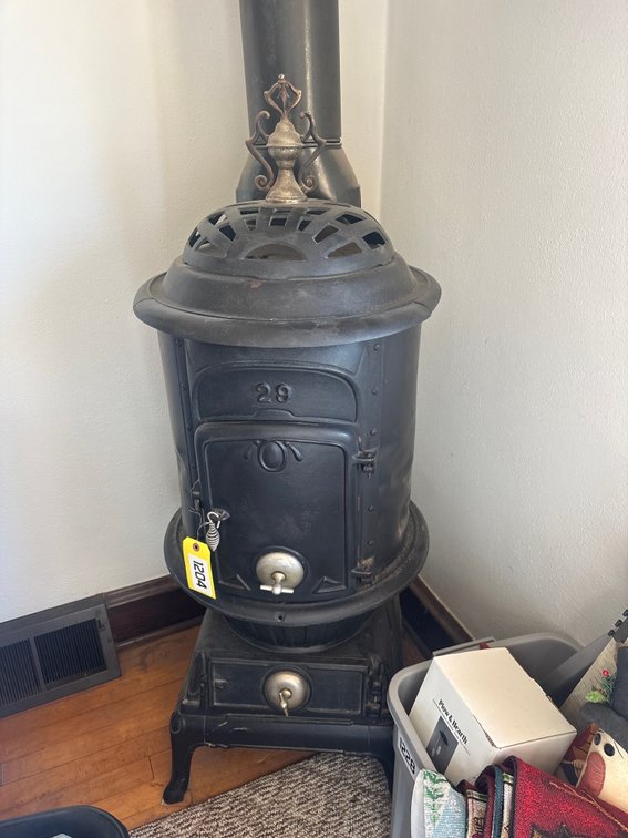 #29 Cast Iron circulating stove with nickel finial