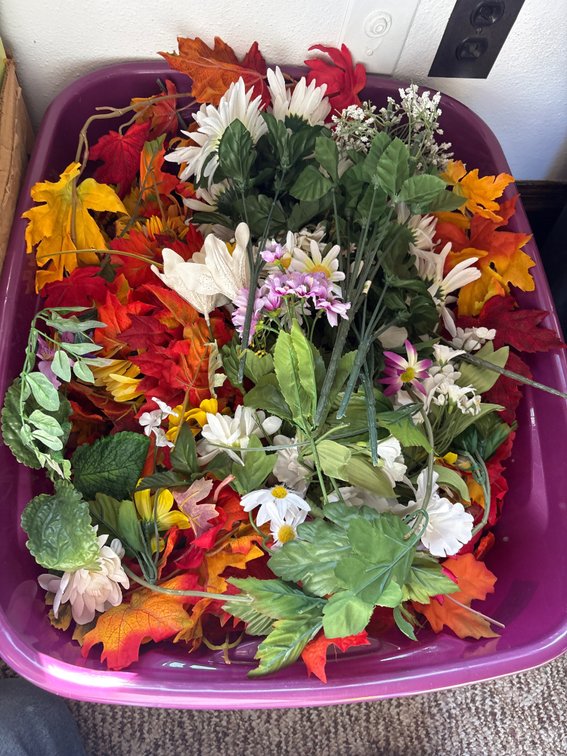 Tote of artificial flowers