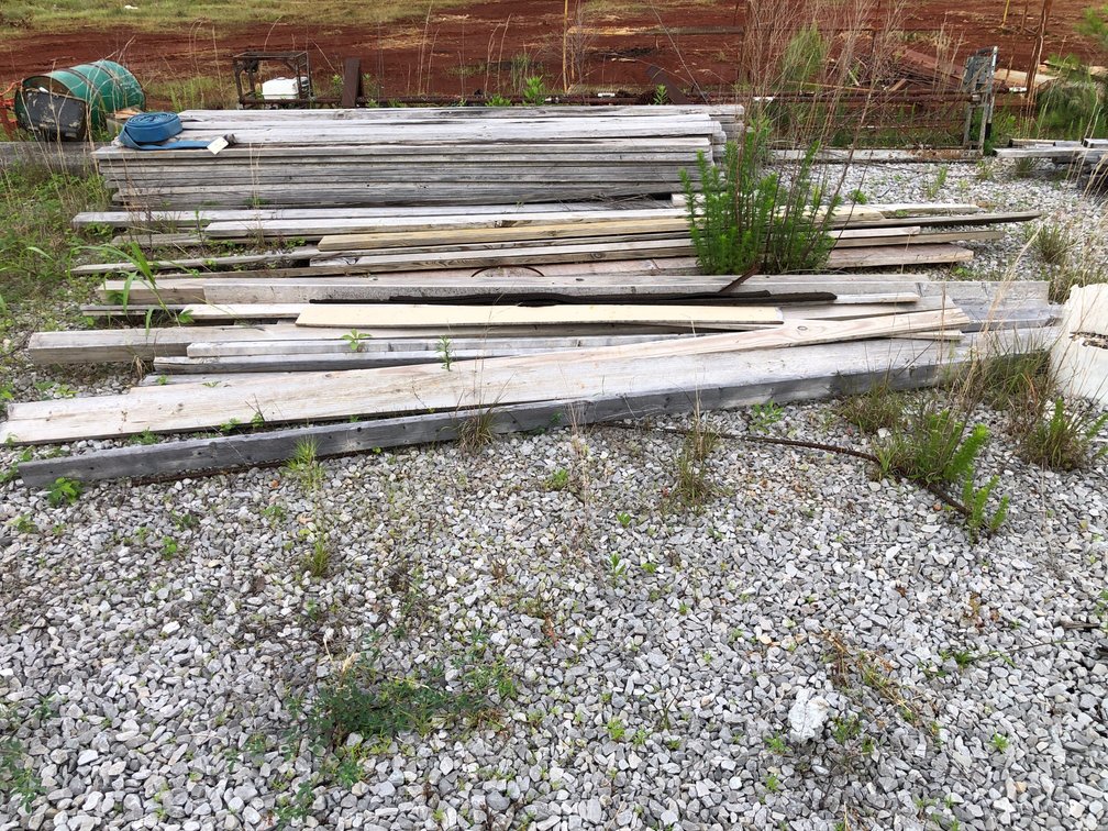 Various lumber including pump hose