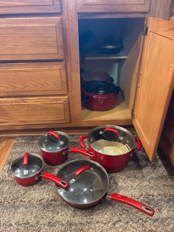 Rachel Ray Cookware And Related In Lower Cabinet