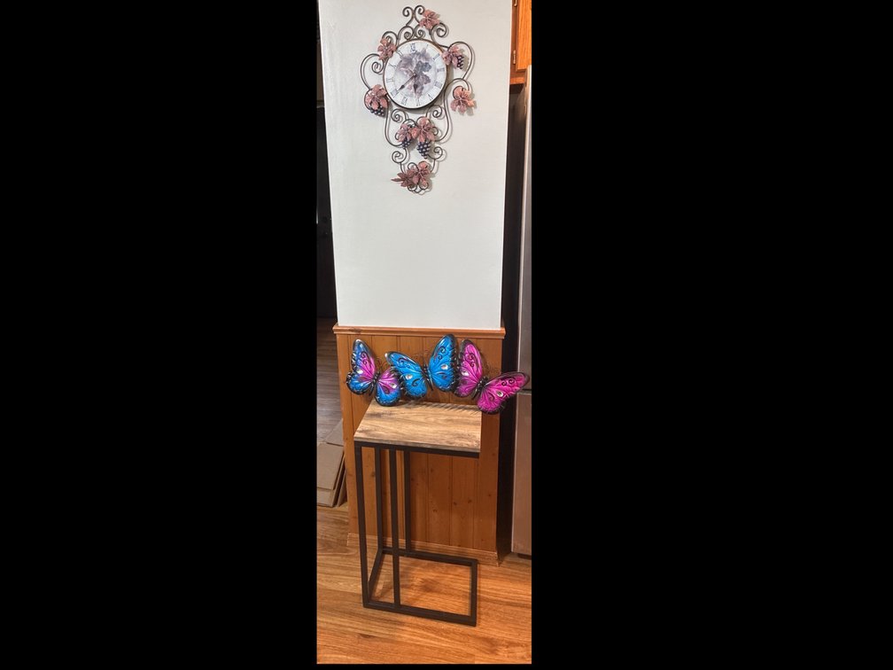 Side Table, Wall Clock And Butterfly Hanging