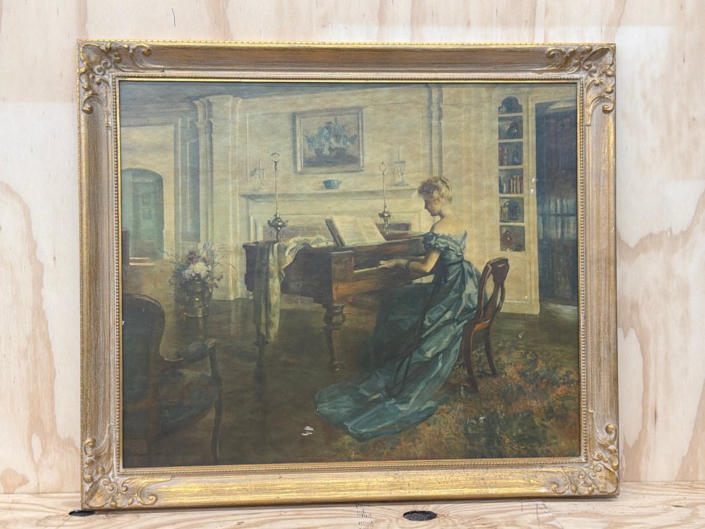Woman at the Piano Framed Print