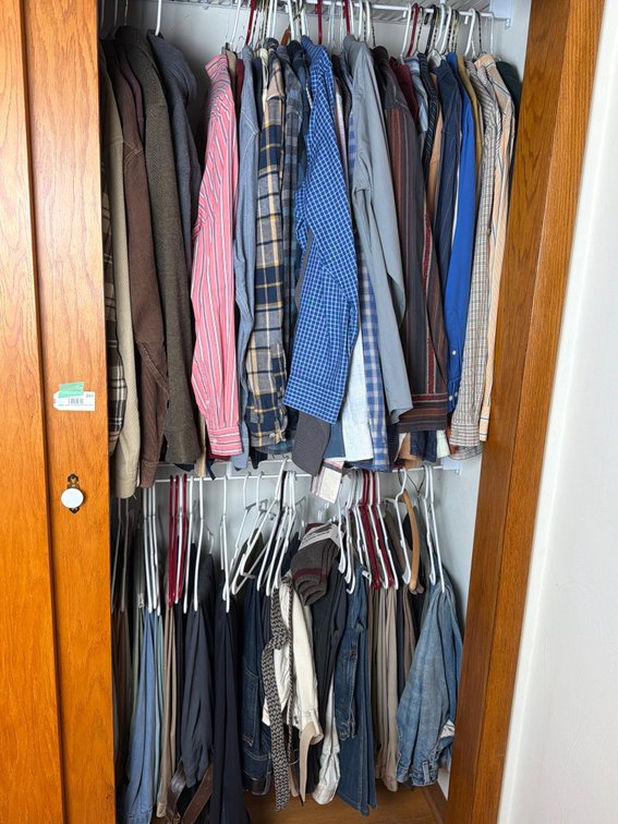 Assorted Mens Clothing in Closet