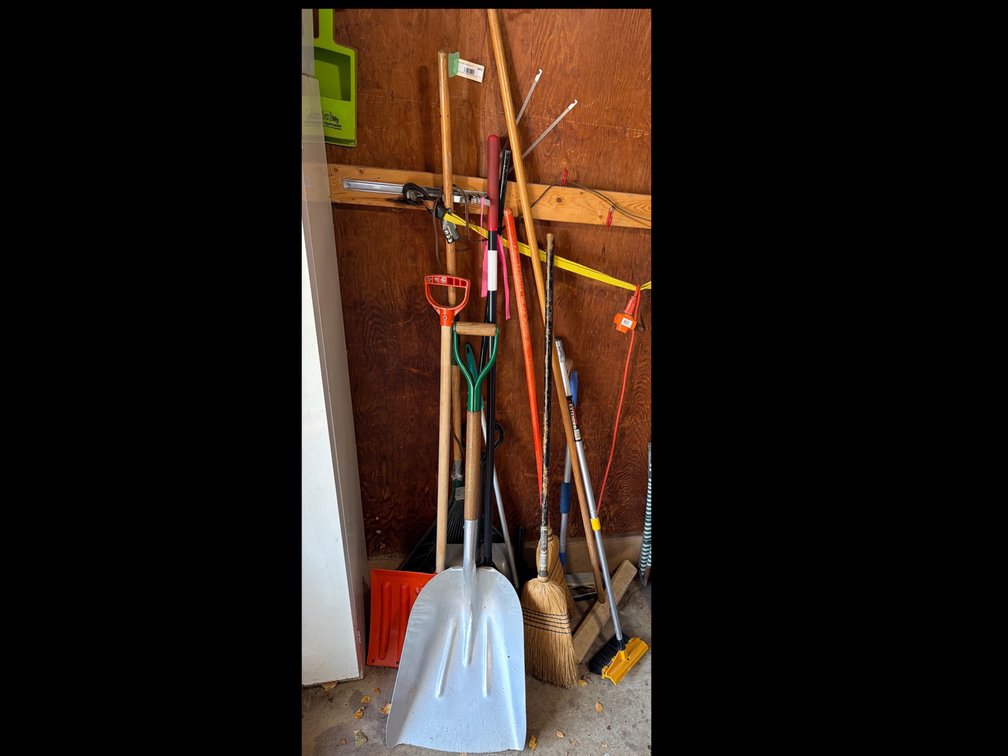Shovels, Rakes, & Assorted Tools Along Wall