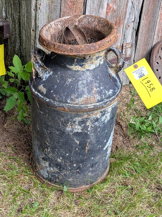 2ft tall milk can.