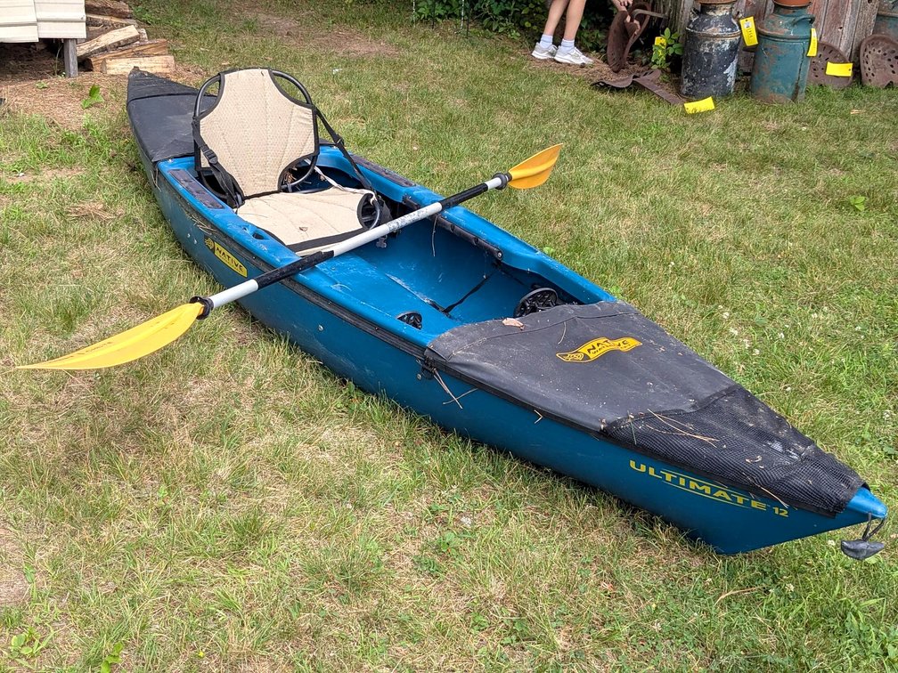 Native WaterCraft Ultimate 12 kayak with Quest Chute paddle.