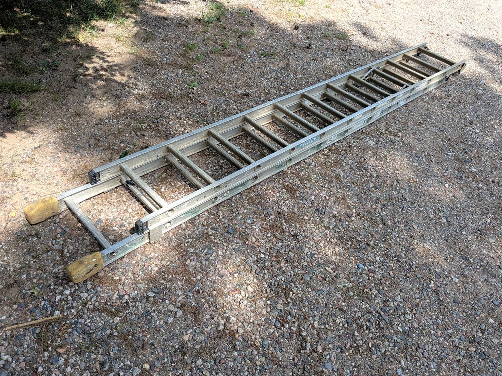 Werner 24ft type 1A aluminum extension ladder is straight.