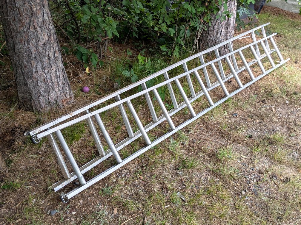 24' aluminum extension ladder is pretty straight.