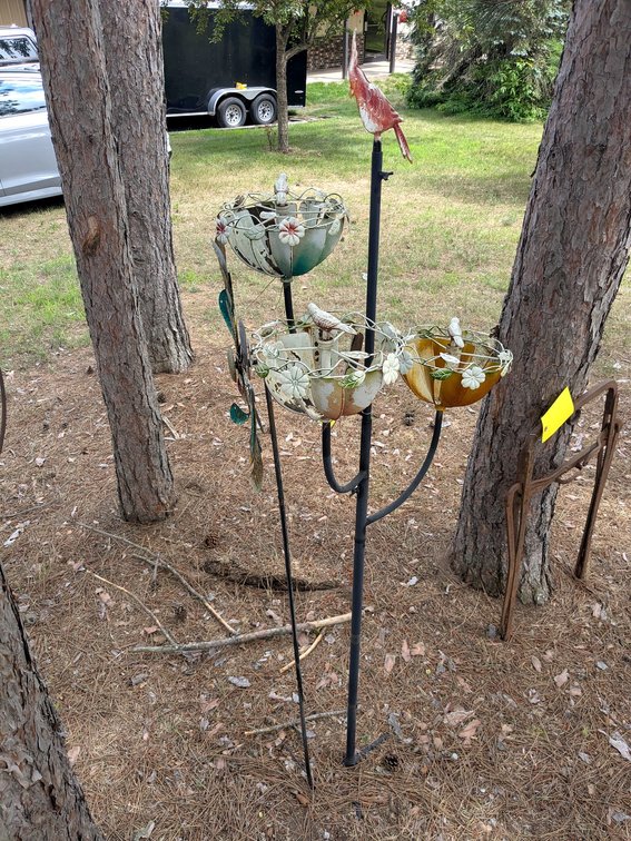 Two neat wind powered yard art pieces up to nearly 6' tall.