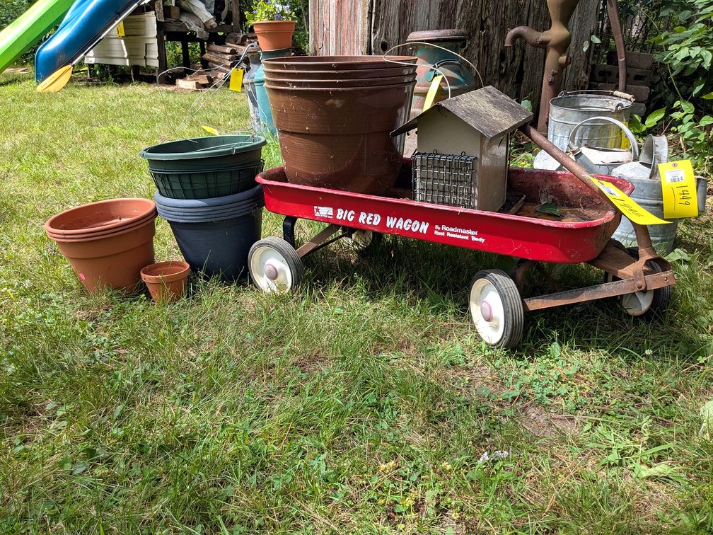 Roadmaster Big Red Wagon comes with 13" wide bird feeder and pots up to 15" wide. Wagon bed about 34