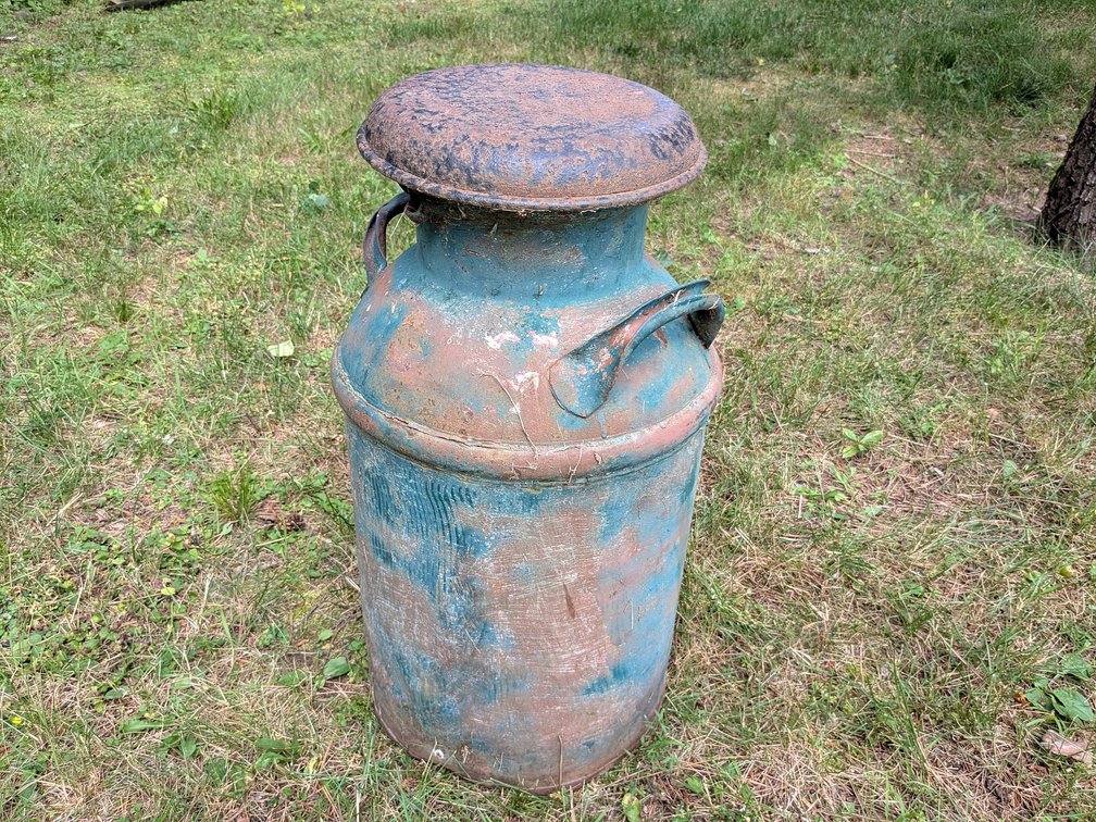 Cute milk can measures 2ft tall.