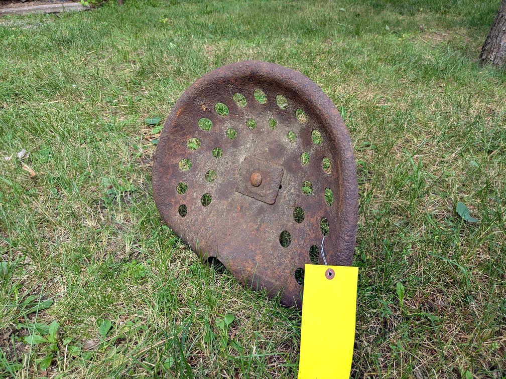Antique tractor seat is approx 17" wide.
