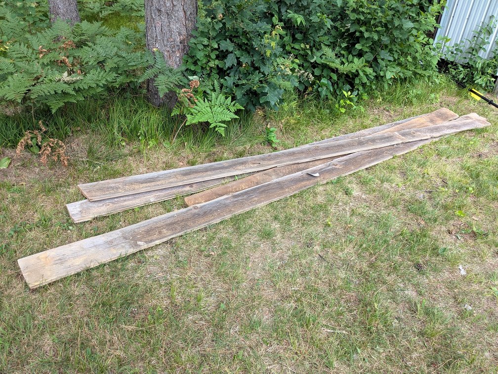 Four pieces of barn wood board , longest approx 15'.