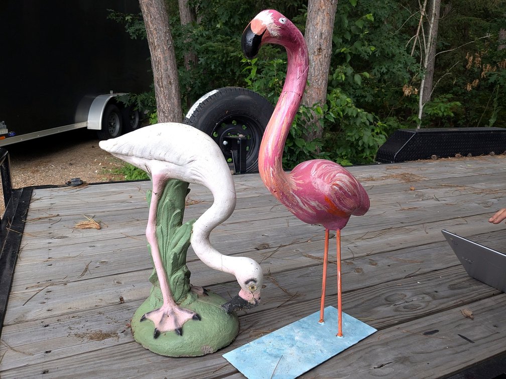 Concrete flamingos up to 28". One with a well done repair.
