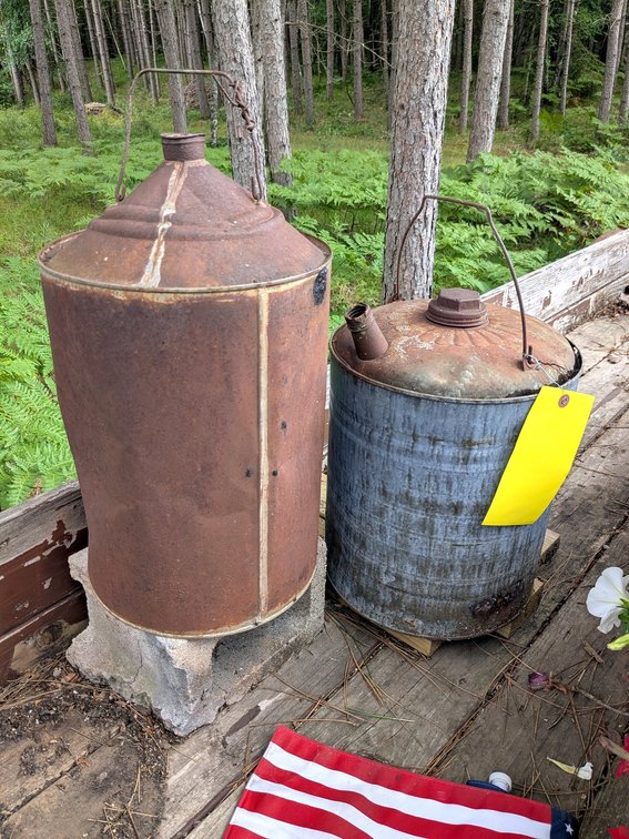 Pair of old oil cans up to 17" overall.