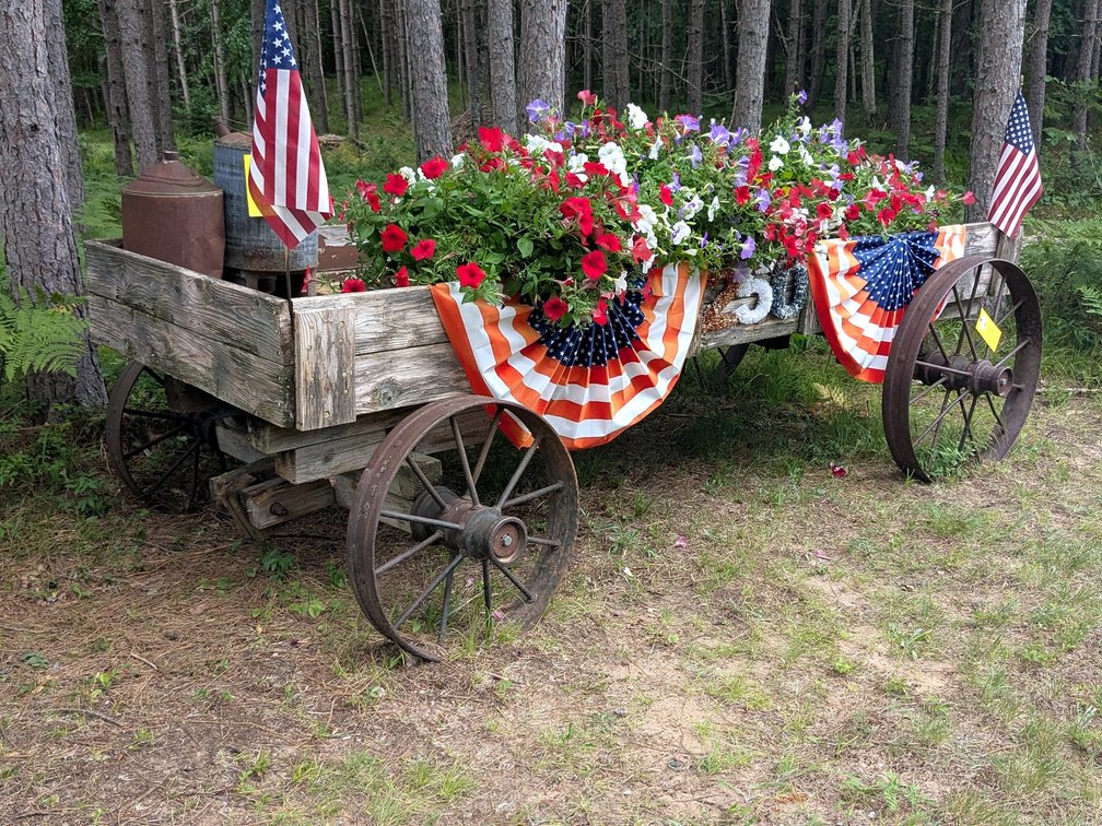 Cute old wagon has a 10' x 40" bed and steel wheels up to 31" wide.