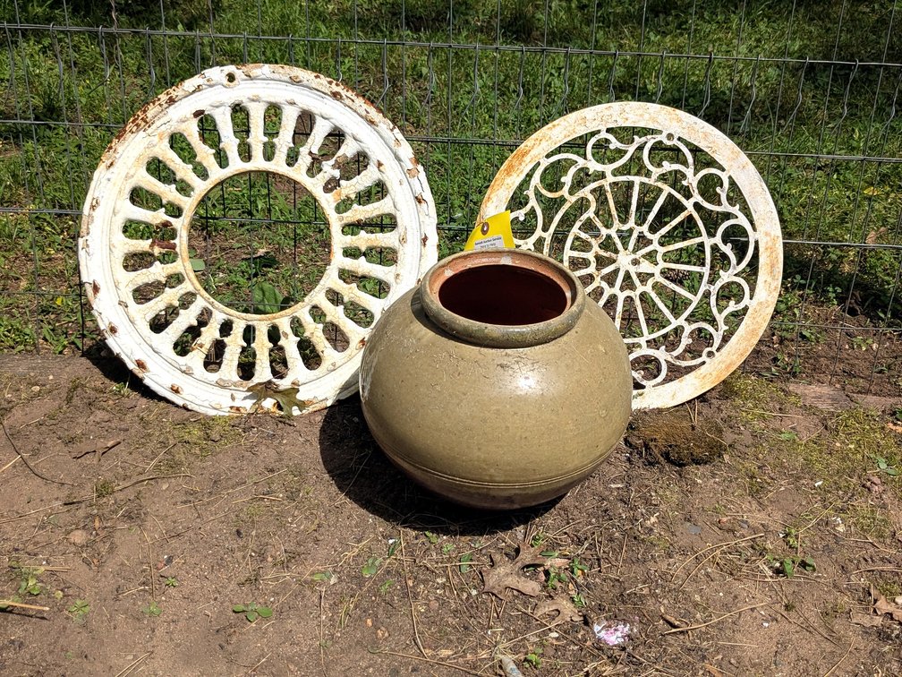 Pair of neat old grates and a handmade signed pottery planter, 11" wide and in good condition.