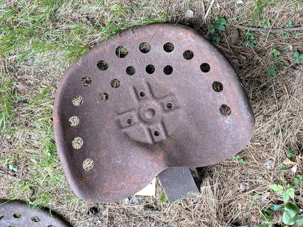 Comfortable looking tractor seat is approx 18" wide.