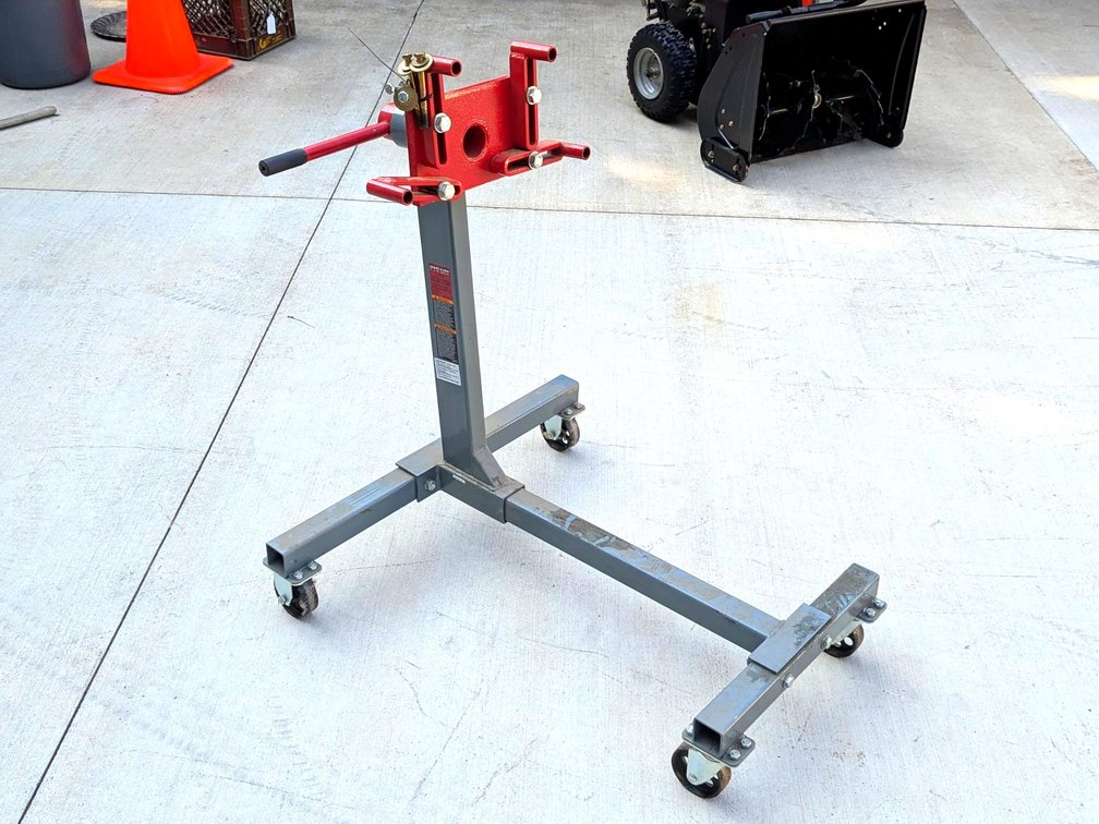 Pro-lift 1000lb  engine stand has a 32" x 30" base. Model T-3101. Plate is 10" x 6".